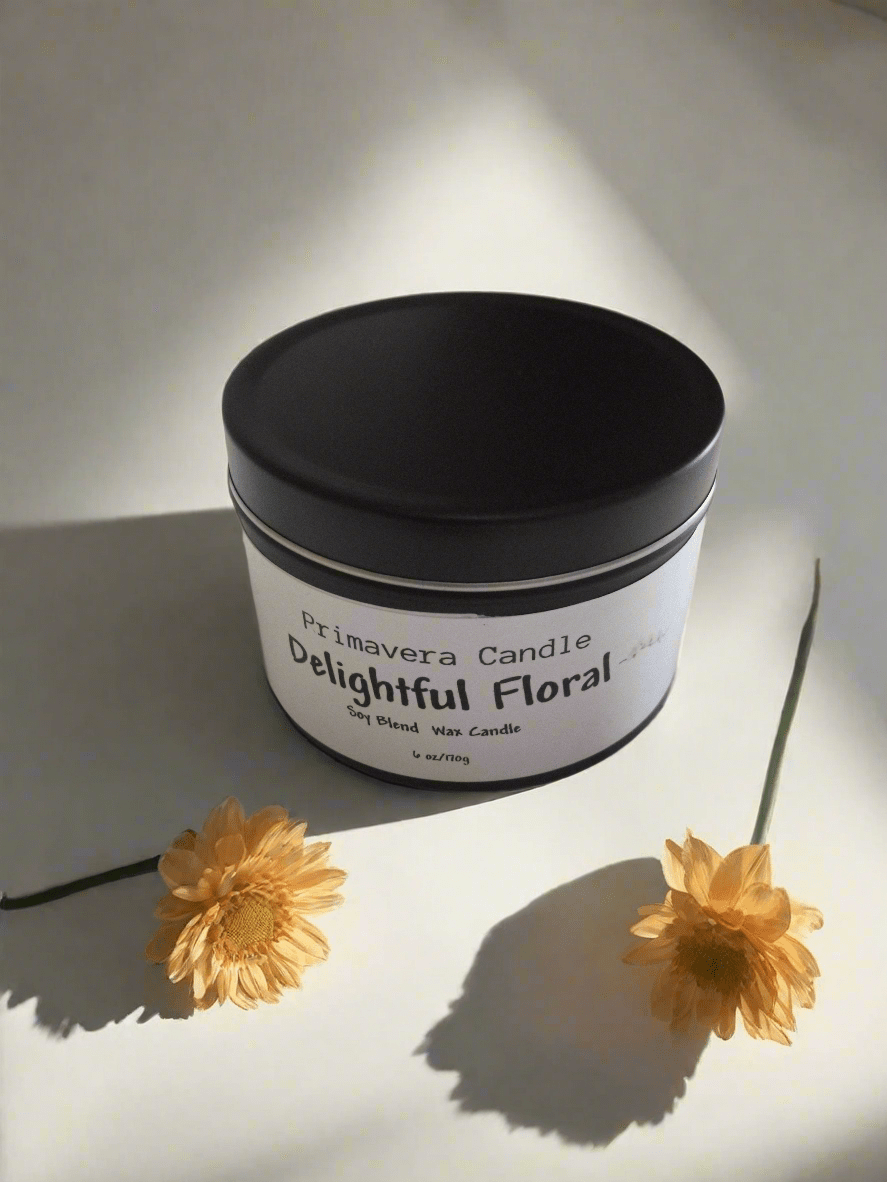 Delightful Floral candle in a black tin by Primavera Candle