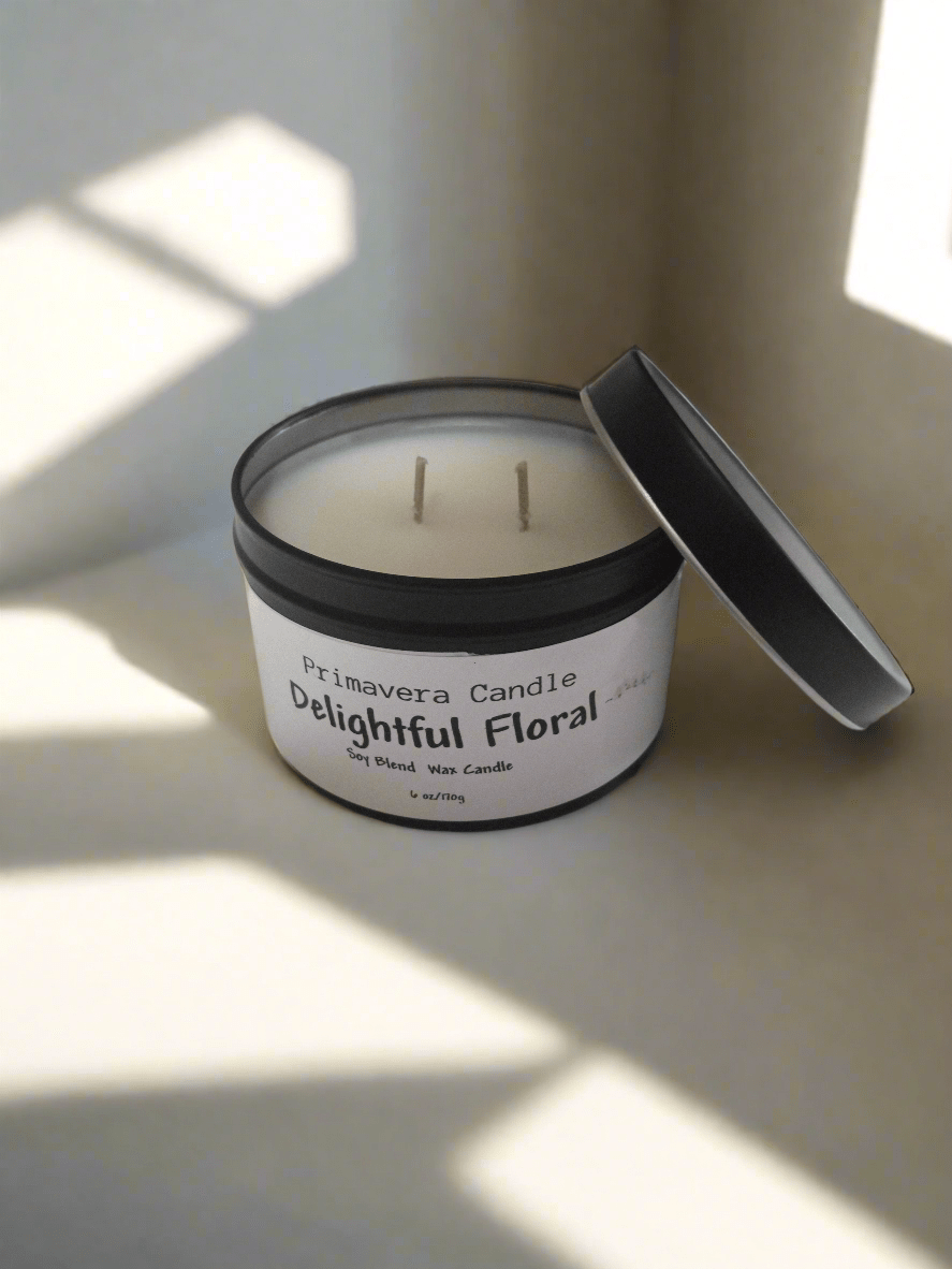 Delightful Floral candle in a black tin by Primavera Candle